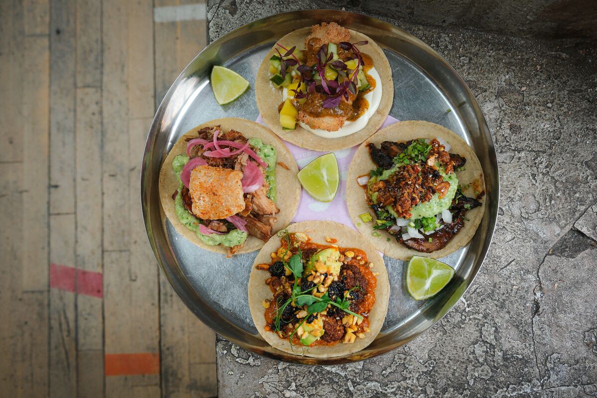 A platter of tacos, served event-style