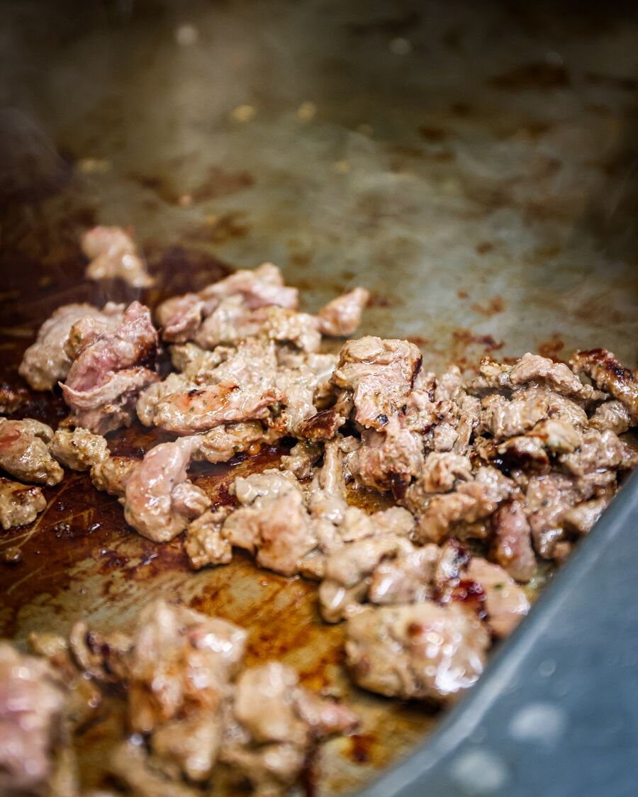 Meat cooking on the plancha